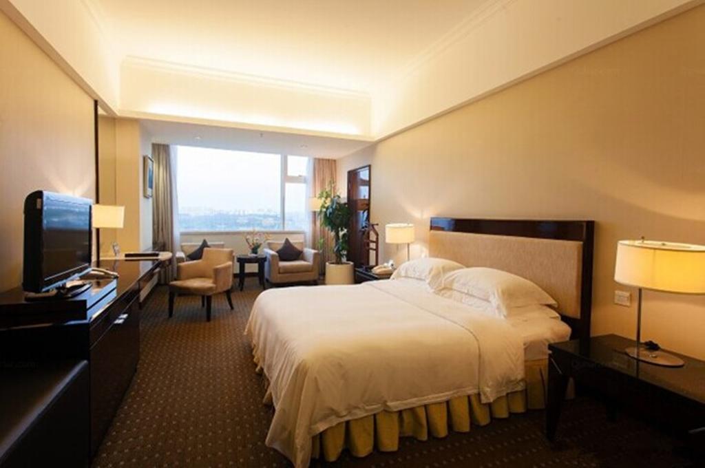 Tienyow Grand Hotel Haikou  Zimmer foto